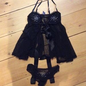 Black two piece babydoll set featuring rhinestone and ribbon details.